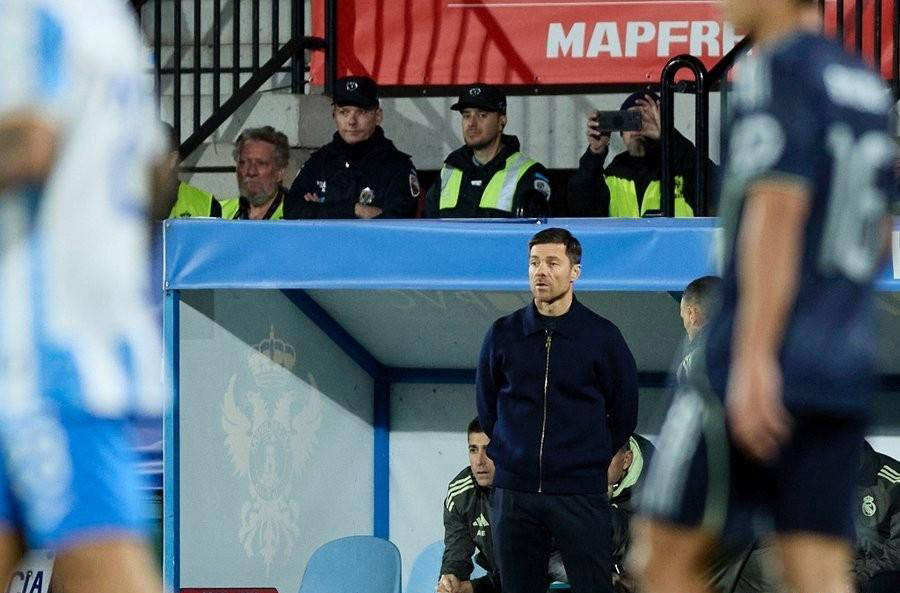 西甲两大豪门联袂晋级,马竞与皇马上演惊险胜利,两球星共创多项纪录